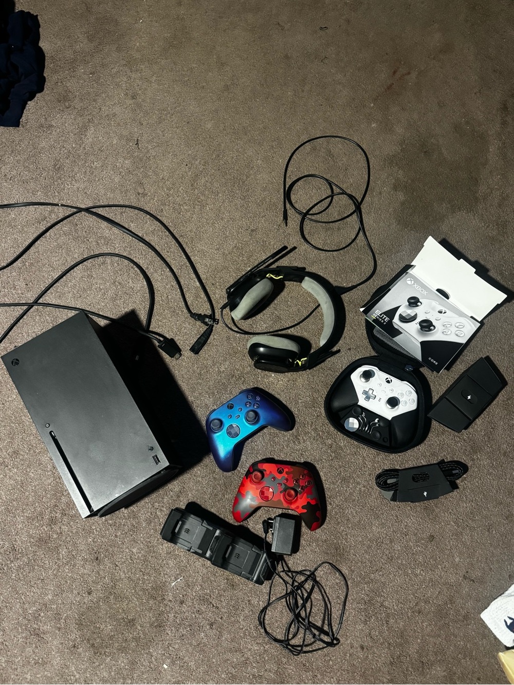 Microsoft Xbox Bundle with Blue and Red Controllers and White Elite Pad